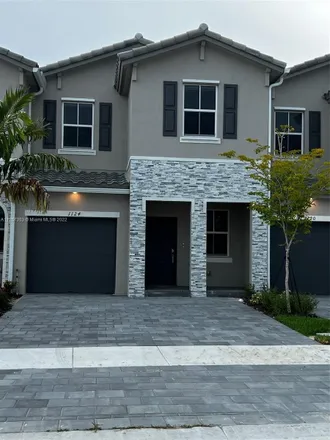 Rent this 4 bed townhouse on 2518 Southeast 20th Place in Homestead, FL 33035