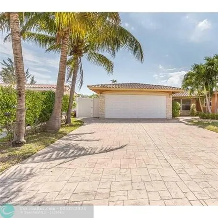 Rent this 4 bed house on 934 Southeast 10th Avenue in Cypress Isles Estates, Pompano Beach