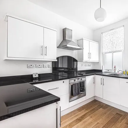 Rent this 3 bed townhouse on Mulberry Court in St. George in the East, London