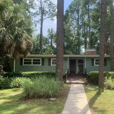 Rent this 4 bed house on 1128 Domingo Drive in Tallahassee, FL 32304