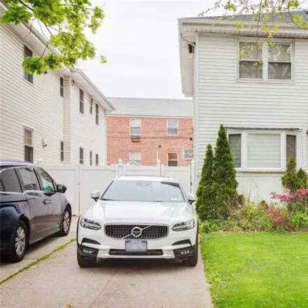 Buy this 3 bed house on 216-17 64th Avenue in New York, NY 11364