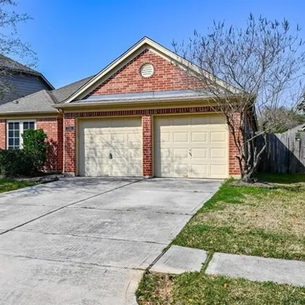 Rent this 4 bed house on 2106 Castle Gardens Lane in Harris County, TX 77449