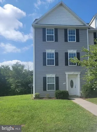 Buy this 4 bed townhouse on 25 Envoy Court in Berkeley County, WV 25428