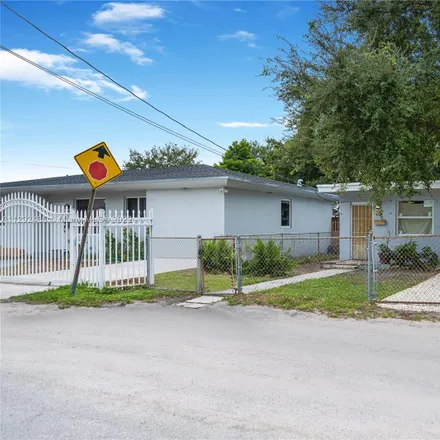 Buy this 2 bed house on 1514 Northwest 69th Terrace in Liberty Square, Miami