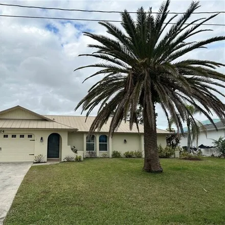 Rent this 3 bed house on 818 Southeast 21st Avenue in Cape Coral, FL 33904