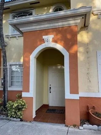 Buy this 3 bed townhouse on 7230 Northwest 174th Terrace in Miami-Dade County, FL 33015