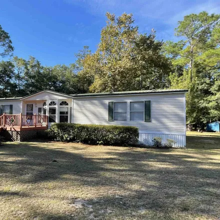 Buy this 4 bed house on 198 Surf Road in Sopchoppy, Wakulla County