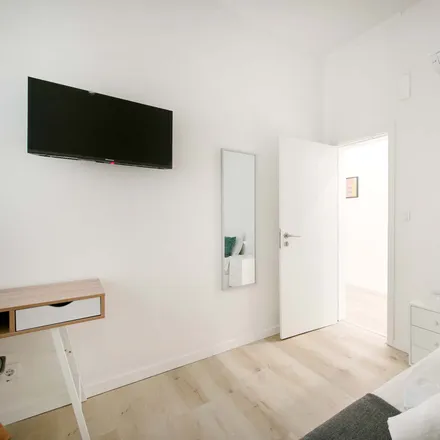 Rent this 7 bed room on Rua Quirino da Fonseca 6 in 1000-047 Lisbon, Portugal