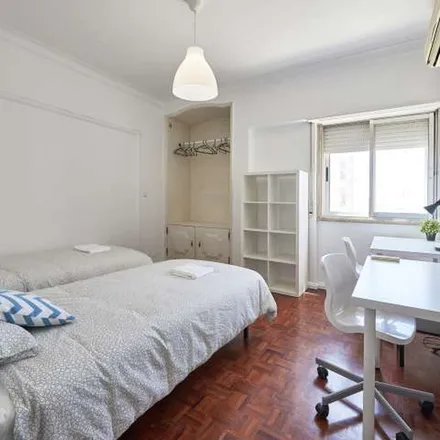 Rent this 8 bed apartment on Clube De Futebol "Os Torpedos" in Rua Sousa Loureiro, 1500-553 Lisbon