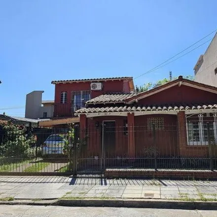 Buy this 3 bed house on 751 - De los Heliotropos in Partido de Tres de Febrero, 1685 Ciudad Jardín Lomas del Palomar