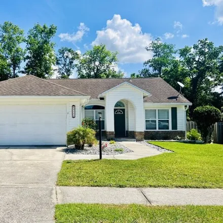 Rent this 3 bed house on Rockpond Meadows Drive in Jacksonville, FL 32221