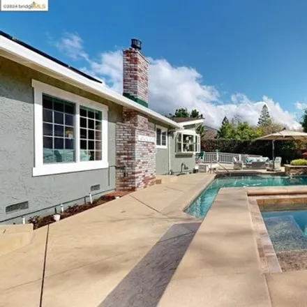 Buy this 4 bed house on 1811 Burl Hollow Court in Walnut Creek, CA 94596