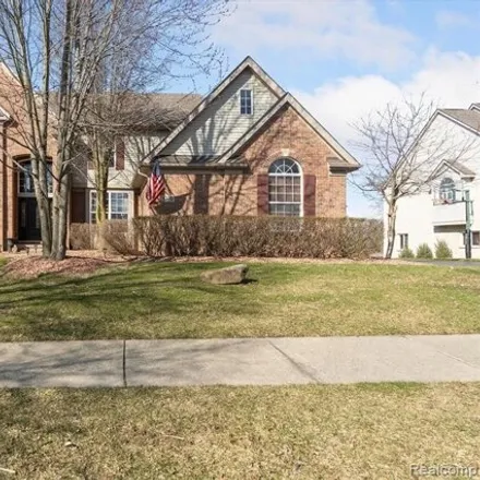 Buy this 5 bed house on 5398 Plantation Drive in Commerce Charter Township, MI 48382