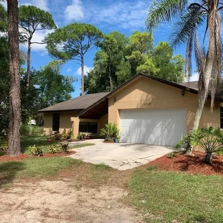 Buy this 3 bed house on 11169 56th Place North in Palm Beach County, FL 33411