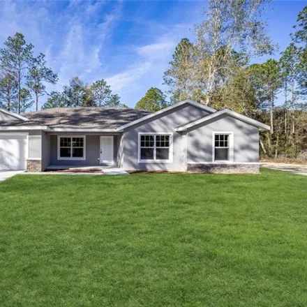 Buy this 4 bed house on 8130 Sw 125th Ter in Dunnellon, Florida