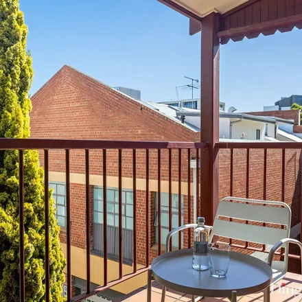 Rent this 3 bed apartment on Kabuki Hair Studio in 93 Grattan Street, Carlton VIC 3053