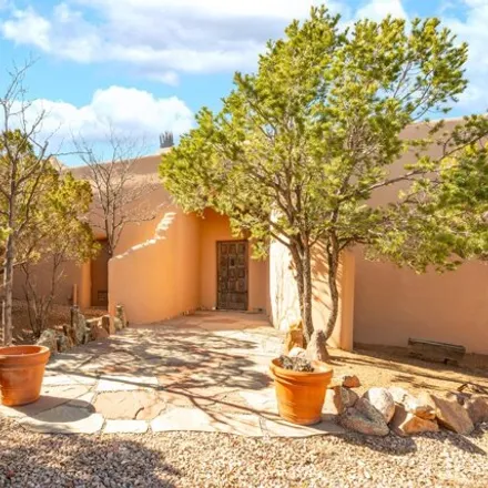 Buy this 5 bed house on 99 Hondo Trail in Santa Fe County, NM 87508