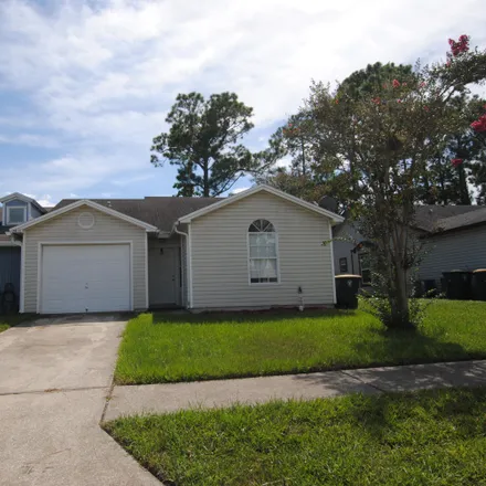 Rent this 3 bed townhouse on 2468 Spring Vale Road in Jacksonville, FL 32246