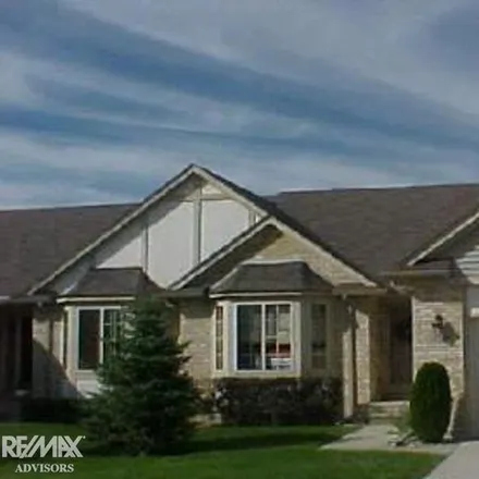 Buy this 2 bed condo on 30192 Raintree Circle in Chesterfield Township, MI 48047