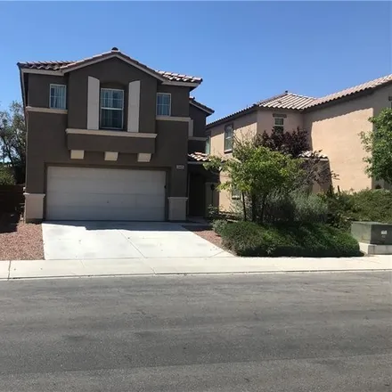 Rent this 4 bed loft on 6445 Chatterer Street in North Las Vegas, NV 89084