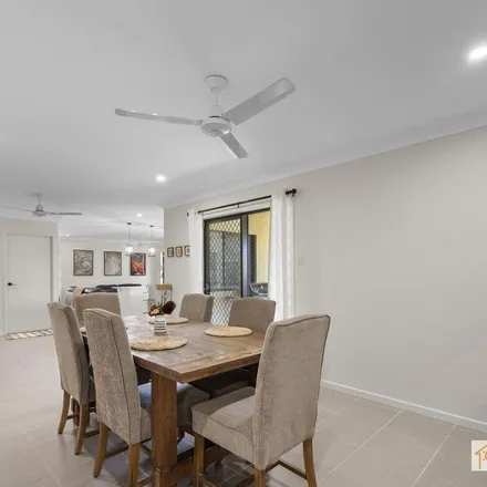 Rent this 4 bed apartment on 63 Hillock Crescent in Bushland Beach QLD 4818, Australia