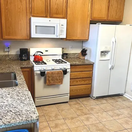 Rent this 3 bed townhouse on 44235 Litchfield Terrace in Ashburn, VA 20147