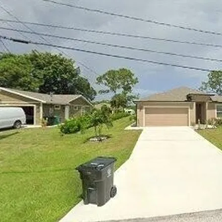 Image 1 - 615 Southwest Todd Avenue, Port Saint Lucie, FL 34983, USA - House for sale