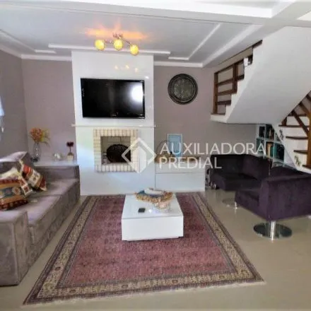 Buy this 3 bed house on Rua Henrique Anawate in Guarujá, Porto Alegre - RS