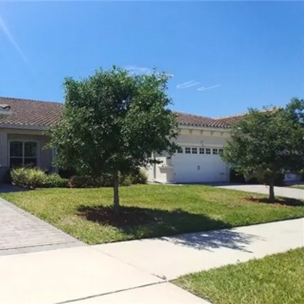 Rent this 3 bed townhouse on 2200 Painter Ln in Kissimmee, Florida