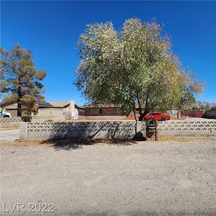 Buy this 4 bed house on 1481 North Gateway Road in Las Vegas, NV 89110