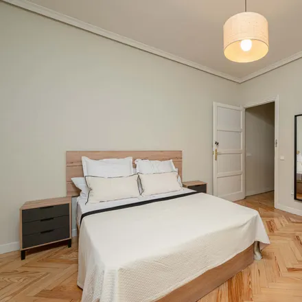 Rent this 7 bed room on Madrid in Marco Aldani, Calle de Martín de los Heros