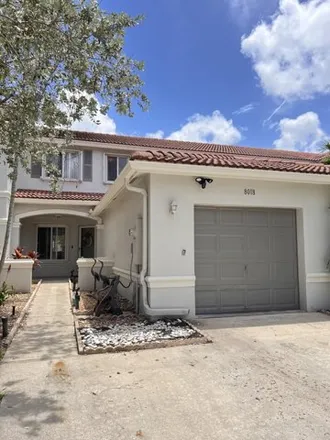 Rent this 2 bed townhouse on 8018 Big Pine Way in Riviera Beach, Florida