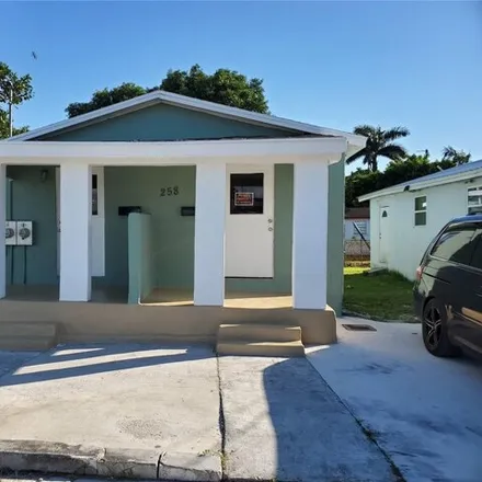 Rent this 2 bed house on 266 Adams Place in Pahokee, Palm Beach County