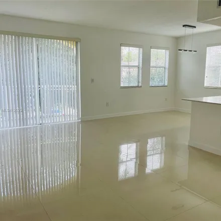 Rent this 3 bed apartment on unnamed road in Miami-Dade County, FL 33174