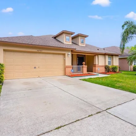 Rent this 4 bed apartment on 30487 Iverson Drive in Pasco County, FL 33543