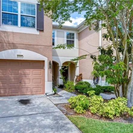 Rent this 3 bed house on 26569 Castleview Way in Seven Oaks, Pasco County