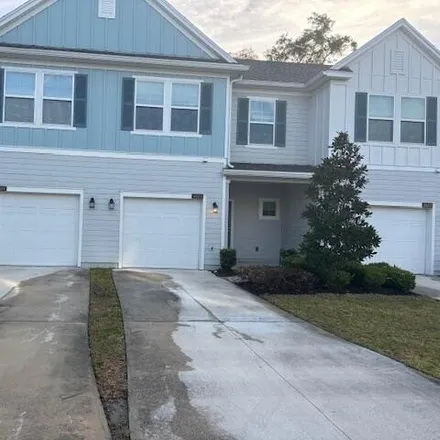 Rent this 3 bed townhouse on Pottsburg Point Drive in Jacksonville, FL 32290