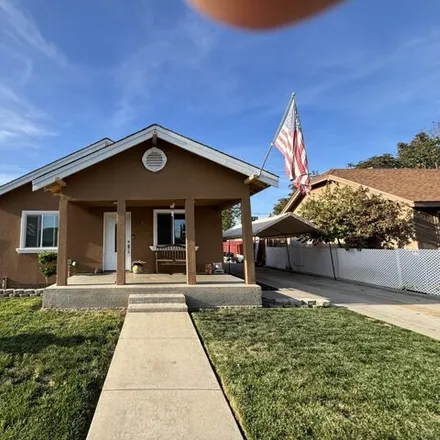 Buy this 2 bed house on 672 East Ventura Avenue in Tulare, CA 93274
