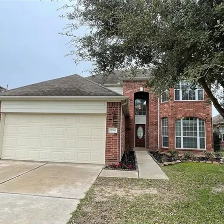 Rent this 4 bed house on 30319 Castle Forest Dr in Spring, Texas