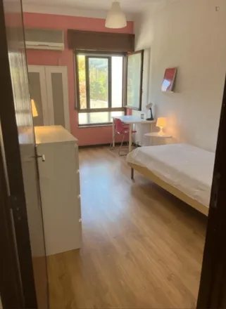 Rent this 4 bed room on LSB-01516 in Avenida Columbano Bordalo Pinheiro, 1070-064 Lisbon