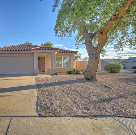 Buy this 4 bed house on 8049 East Olla Avenue in Mesa, AZ 85212