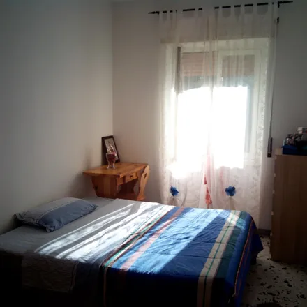 Rent this 3 bed room on Via Aquilonia in 00177 Rome RM, Italy