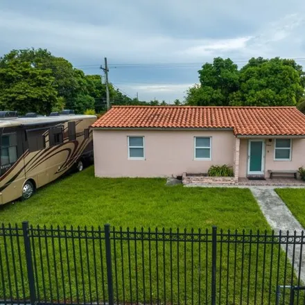 Buy this 3 bed house on 3360 East 10th Avenue in Sun-Tan Village, Hialeah