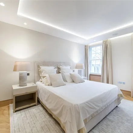 Rent this 3 bed apartment on 46 Upper Grosvenor Street in London, W1K 2ND