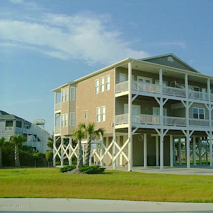 Rent this 4 bed townhouse on 105 Inlet Court in Emerald Isle, NC 28594