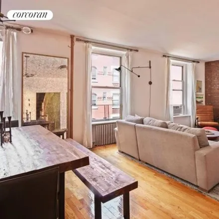 Rent this 2 bed townhouse on 52 Spring Street in New York, NY 10012