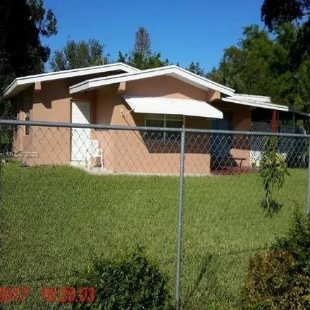 Buy this 3 bed house on 2937 Northwest 29th Terrace in Flamingo Village, Broward County