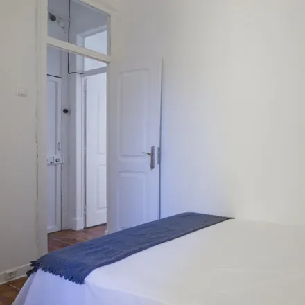 Rent this 5 bed room on Rua António Pedro 141 in 1000-040 Lisbon, Portugal
