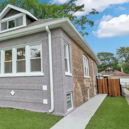 Buy this 3 bed house on 1418-1420 West 105th Place in Chicago, IL 60643