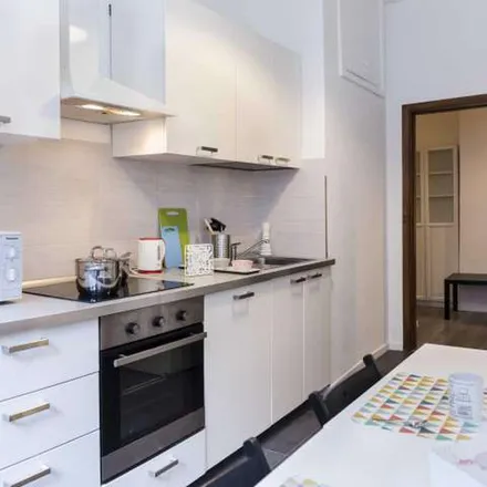 Rent this 6 bed apartment on Edificio di Via Roentgen in Via Corrado Guglielmo Rontgen, 20136 Milan MI